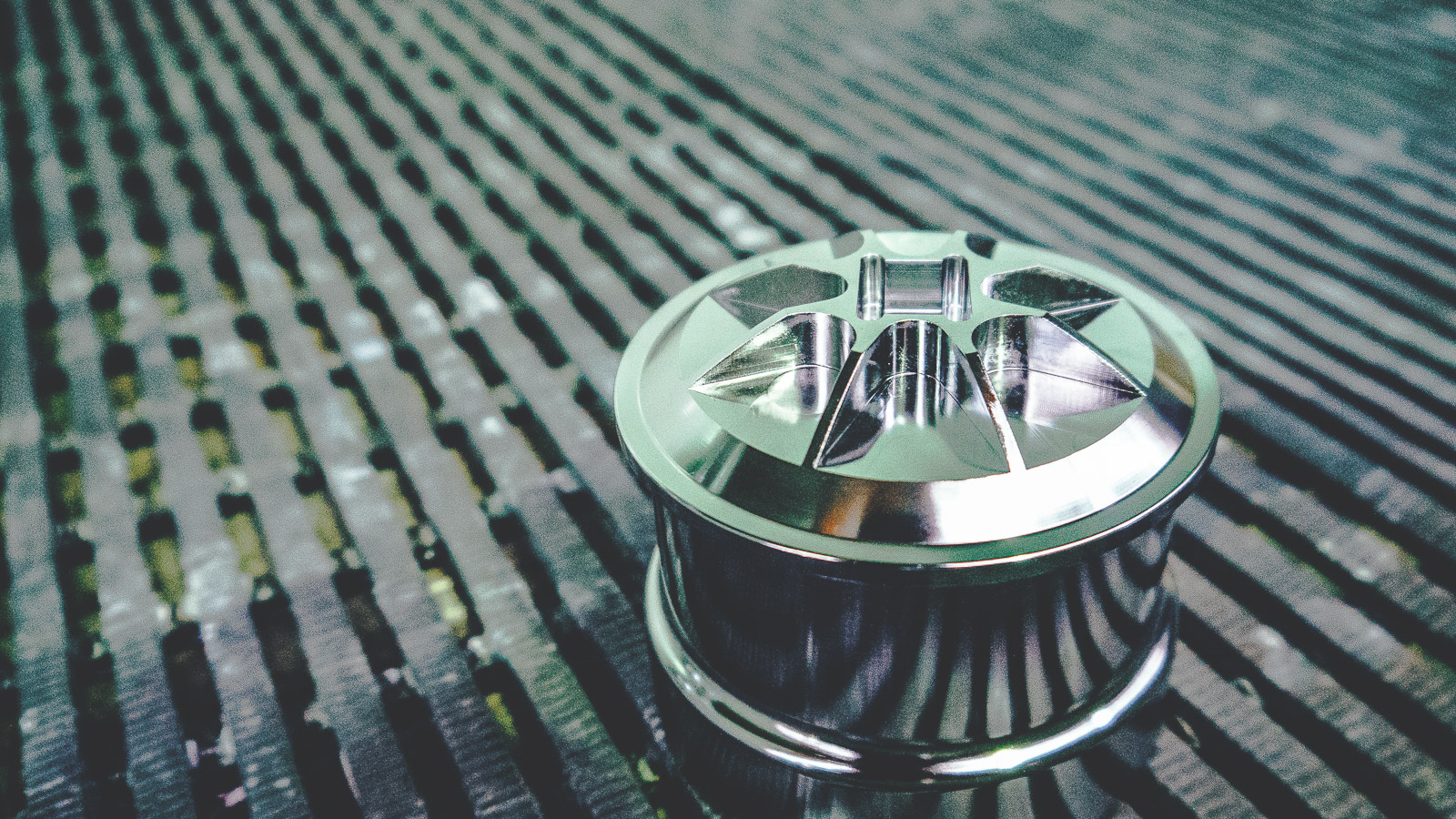 Small precision-engineered metal component at Anopol